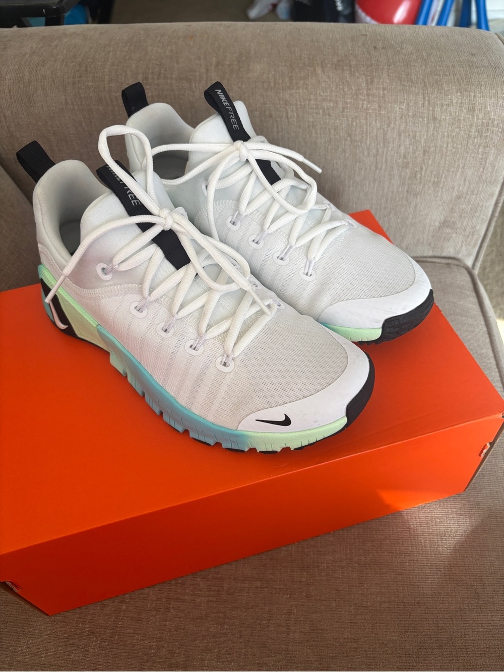 Nike White Athletic Shoes with Mint and Black Accents